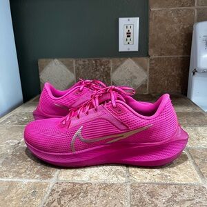 Women's Nike Air Zoom Pegasus 40 running shoe in the 'Fierce Pink' color